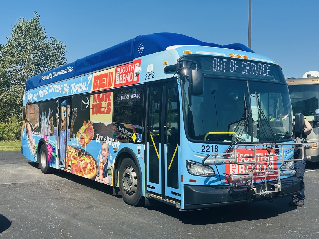 A full large-format graphics wrap on a South Bend transit bus.