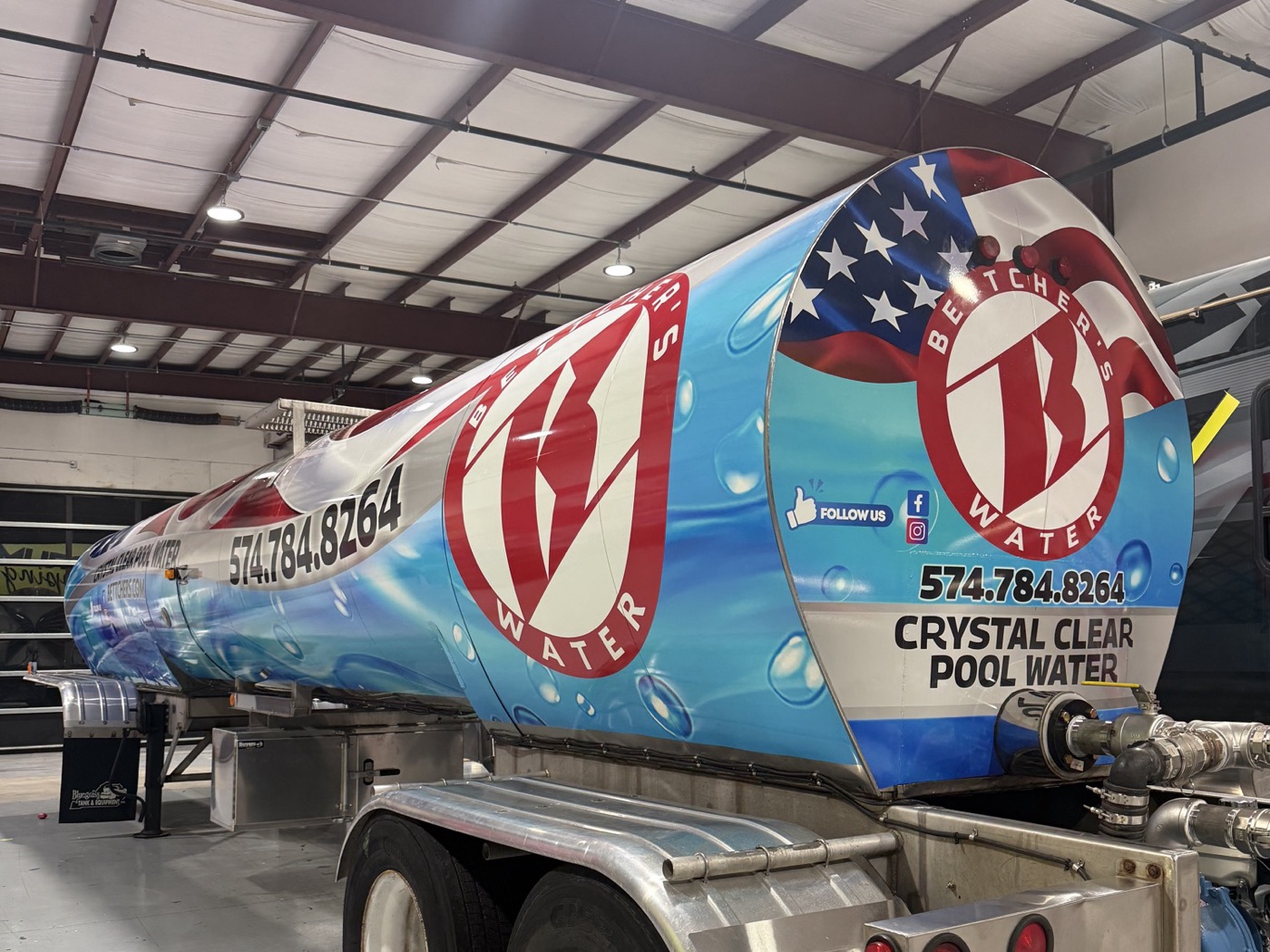 Full tanker wrap with water and flag graphics for Bettcher&rsquo;s Pool Water.