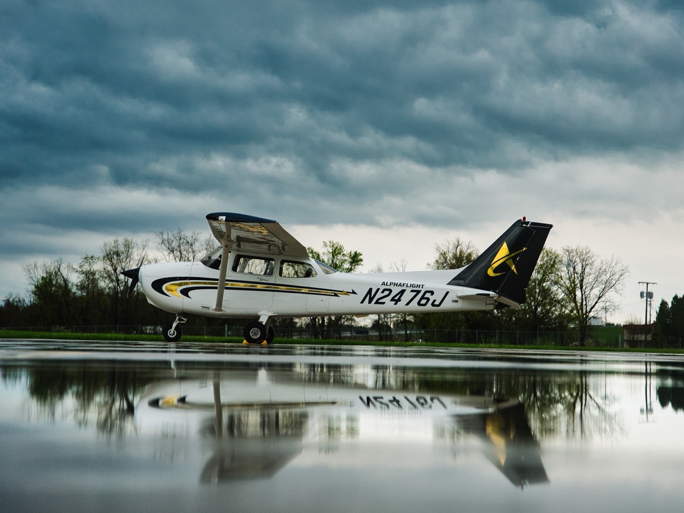 Custom aircraft wrap graphics on an AlphaFlight Cessna.