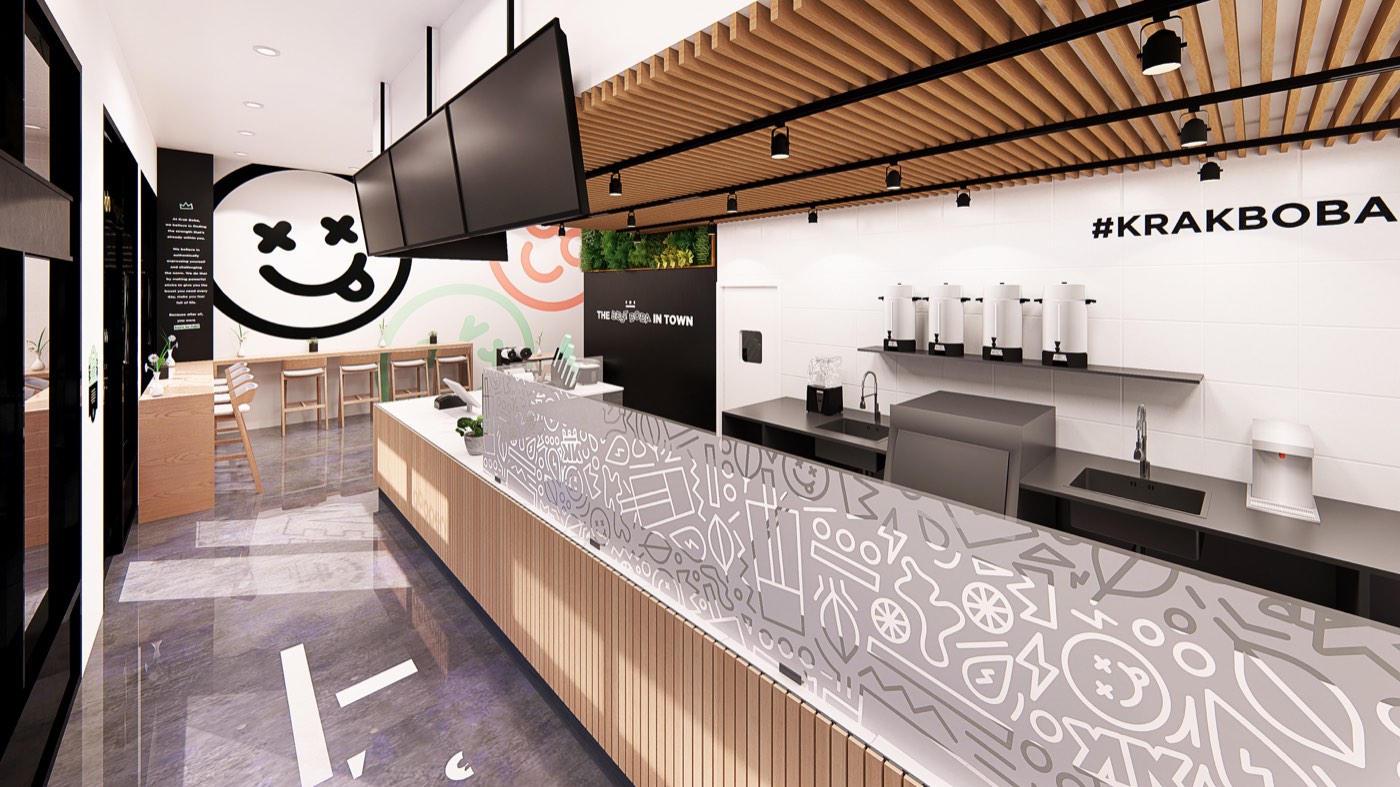 Krak Boba store interior with a wall mural and patterned counter graphics.