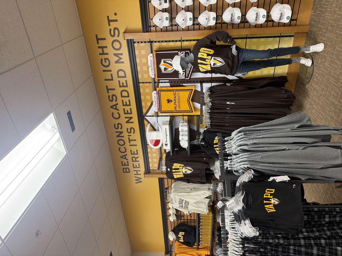 Interior wall wrap and branded retail environment for a campus bookstore.