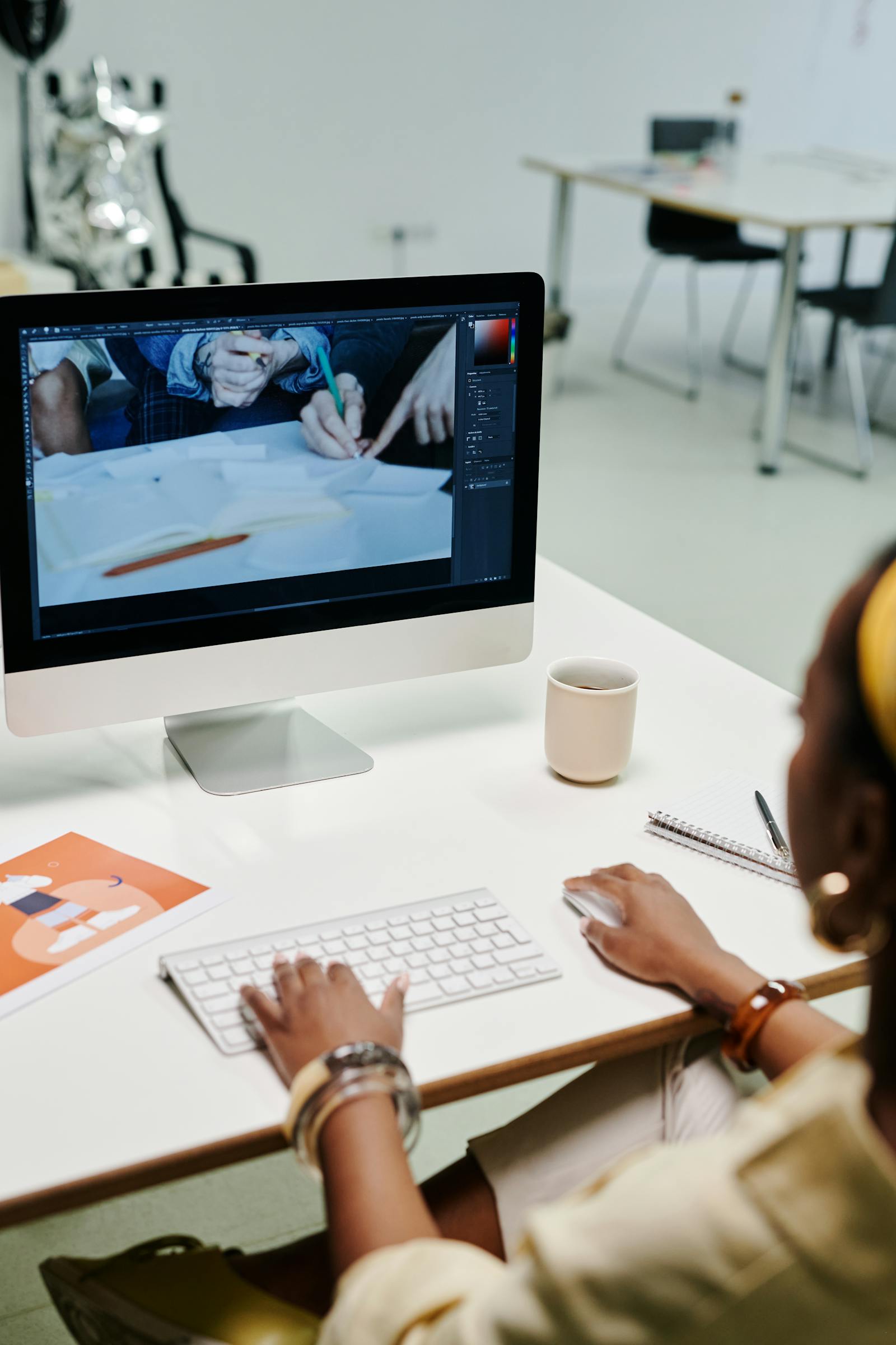 In-house design and proofing at a creative studio (illustrative)